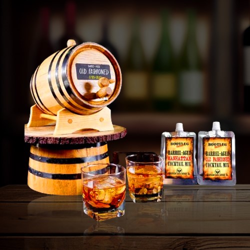 wooden barrel with two glasses & whiskey bottle