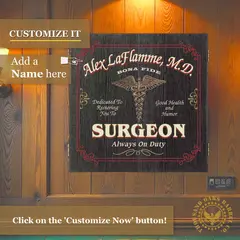Personalized surgeon dartboard cabinet mounted on wall with custom name option shown