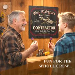 Father and son playing darts in workshop with personalized contractor dartboard cabinet featuring custom name design