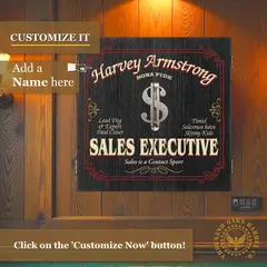 Personalized Sales Executive dartboard cabinet mounted on wood wall showing custom name placement area and vintage executive design.