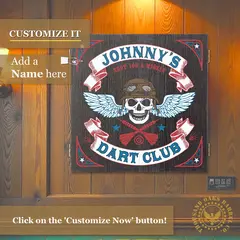 Custom skull dartboard cabinet with personalized name option mounted on wood wall, biker-style design perfect for man cave, garage bar, or game room decor.