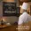 Personalized Master Chef dartboard cabinet mounted on restaurant wall with chef viewing custom name design