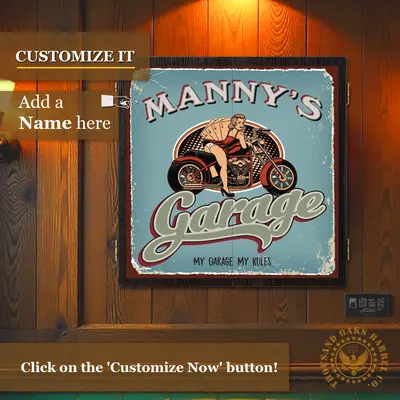 Custom motorcycle garage dartboard cabinet mounted on wall, featuring retro pin-up biker artwork and personalized name design