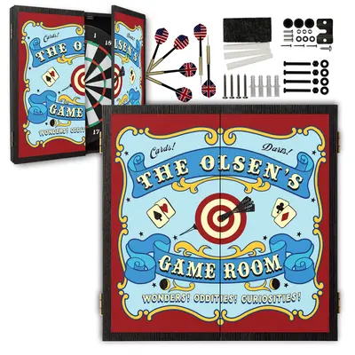 Personalized vintage carnival-themed dartboard cabinet set with custom name, featuring “The Olsen’s Game Room” design, dartboard, steel-tip darts, and mounting hardware.