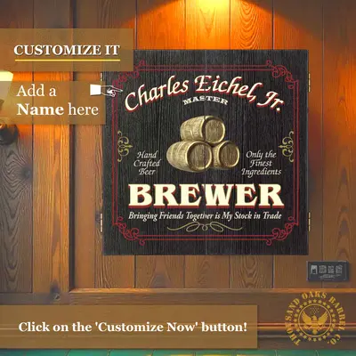 Personalized brewer dartboard cabinet mounted on wood wall showing custom name design and brewery-themed artwork.