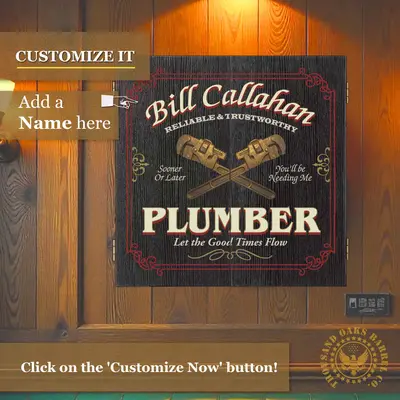 Personalized Plumber dartboard cabinet mounted on wood wall with custom name and crossed pipe wrench design