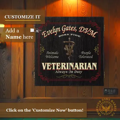 Custom veterinarian dartboard cabinet mounted on wood wall featuring personalized name and veterinary caduceus design
