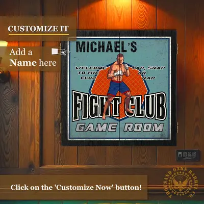 Personalized Fight Club dartboard cabinet mounted on wood wall showing custom name option