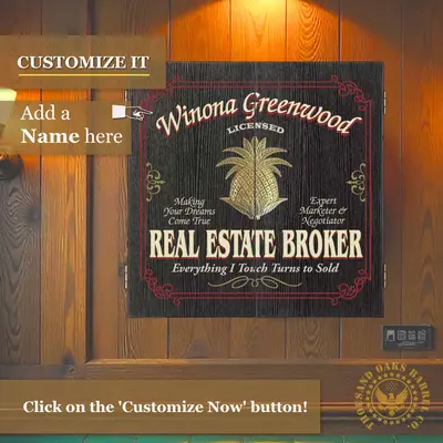 Custom real estate broker dartboard cabinet hanging on wall with personalized realtor name design