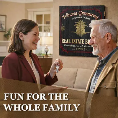Real estate agent giving house keys to happy client with personalized real estate broker dartboard cabinet in background